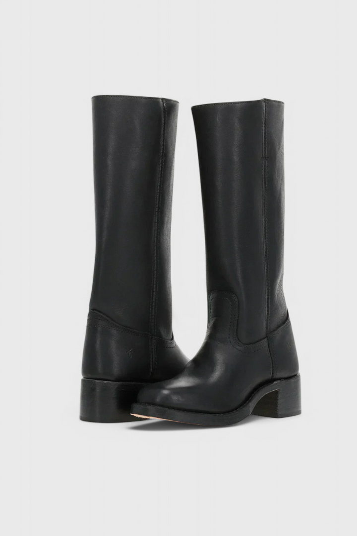 Comfortable women's black knee-high heeled boots, ideal elegant footwear for any occasion.