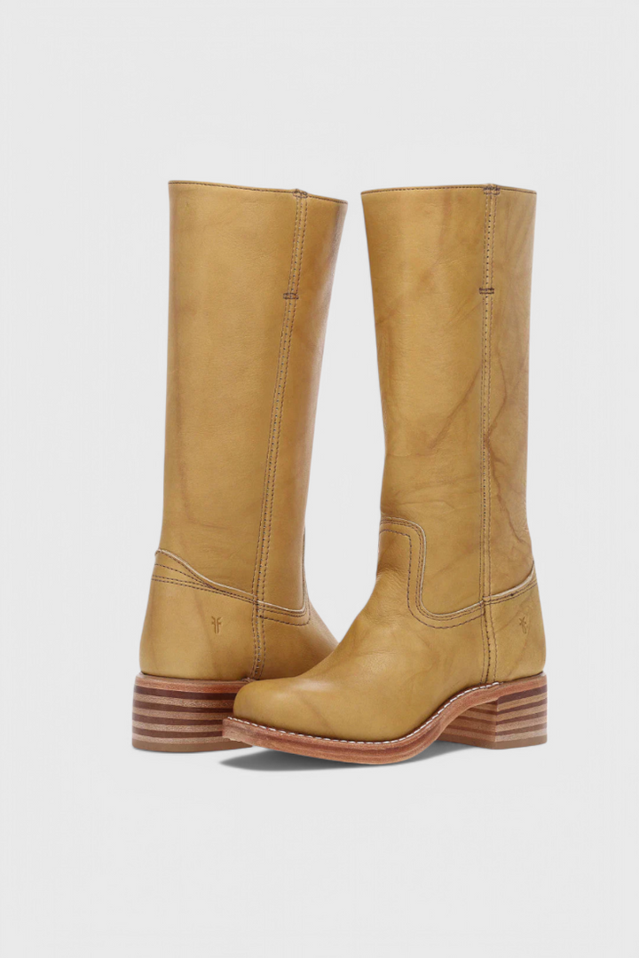 Fashionable ladies' leather knee-high boots, high heel, a versatile and classic wardrobe essential.