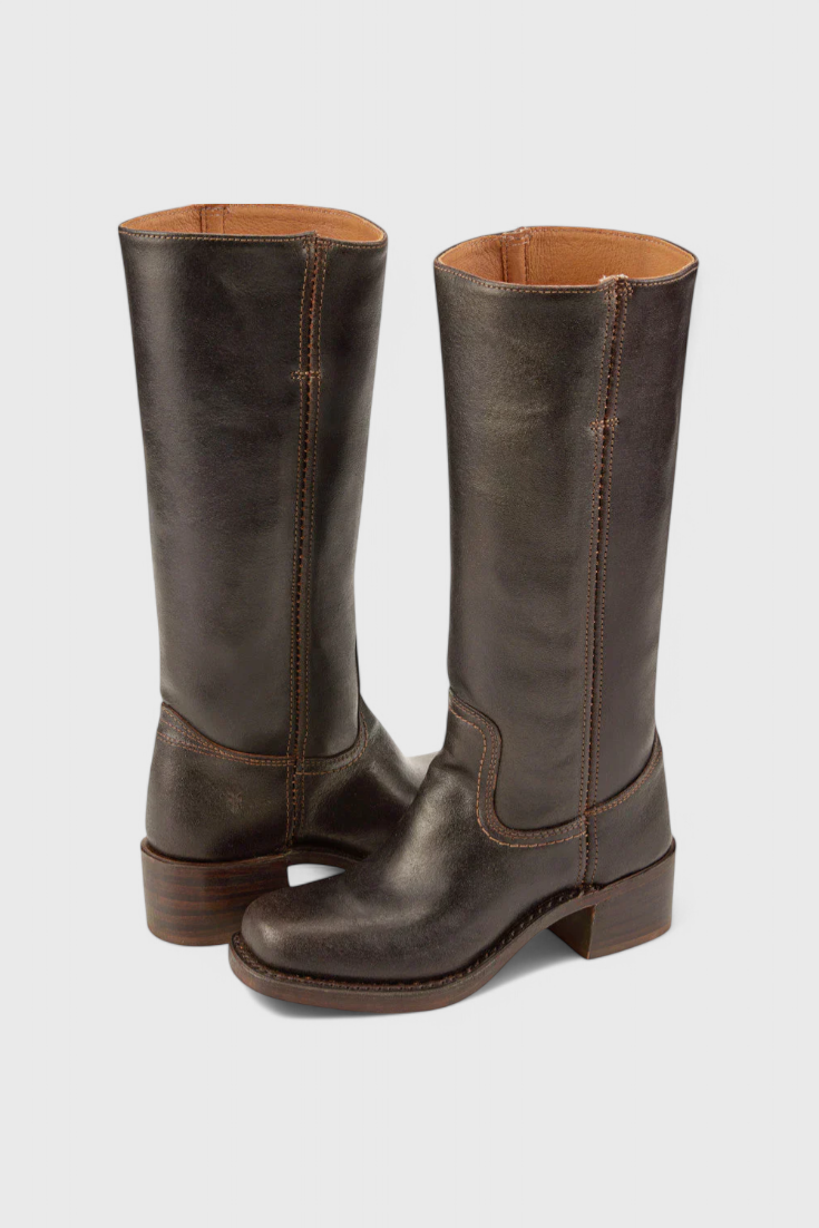 Elegant brown leather knee-high boots for women, featuring a comfortable heeled design.