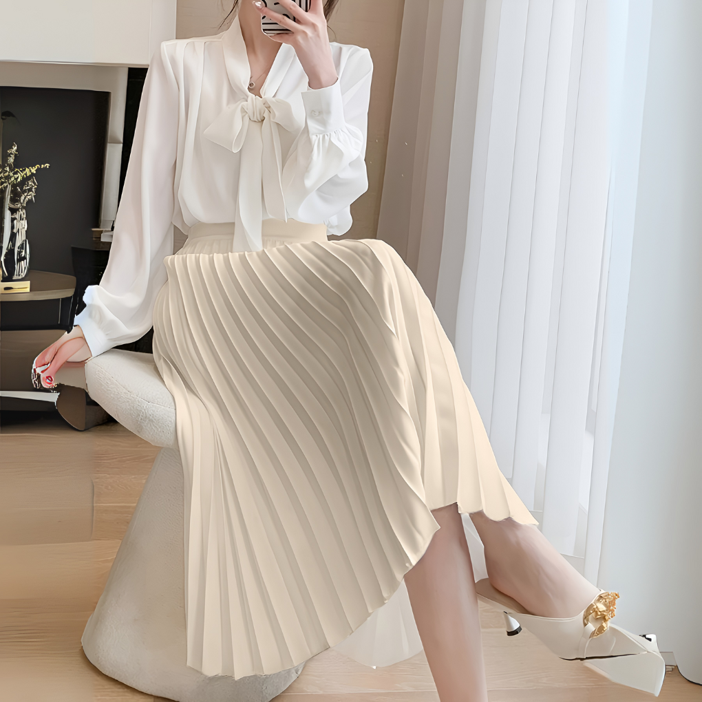Chic women's high-waist pleated midi skirt in black, offering a stylish and professional look.
