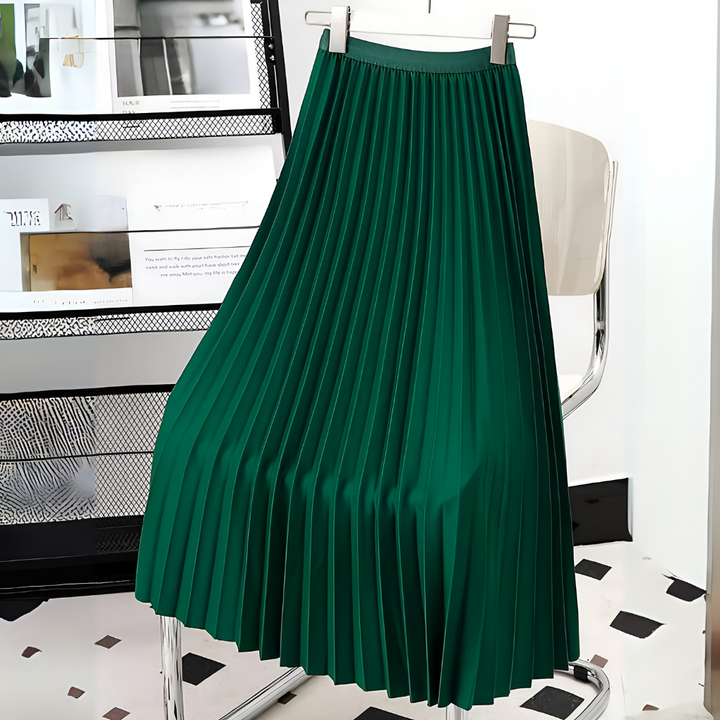 Close-up of elegant pleated high-waist midi skirt fabric, showcasing precise pleats and quality.
