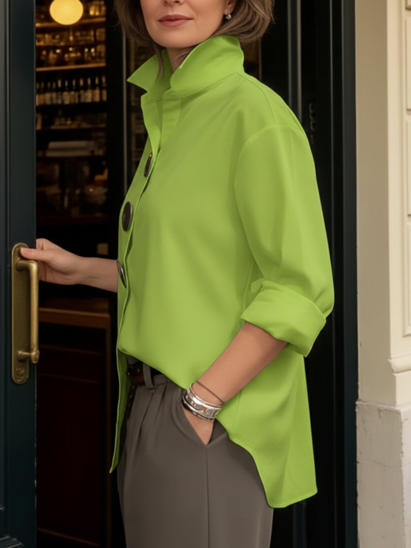 Women's elegant blouse, a chic collared top with prominent big button detail for a refined work or casual style.