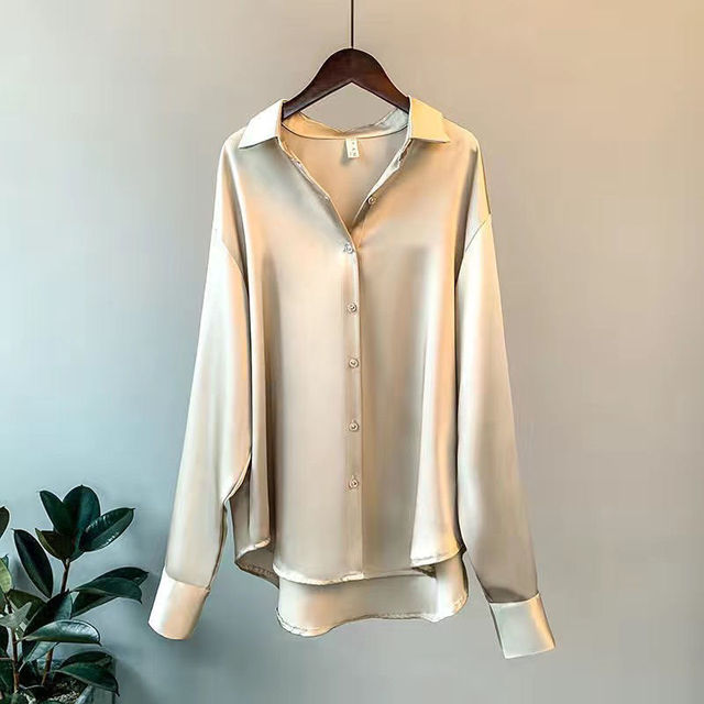 Women's elegant blouse with long sleeves, classic collar & button-up front. Perfect for office or chic casual wear.