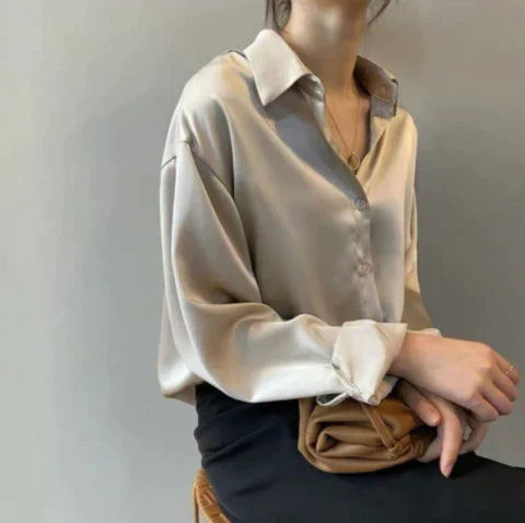 Ladies' elegant long sleeve blouse with classic collar & loose fit. A timeless, comfortable top for office to casual chic.