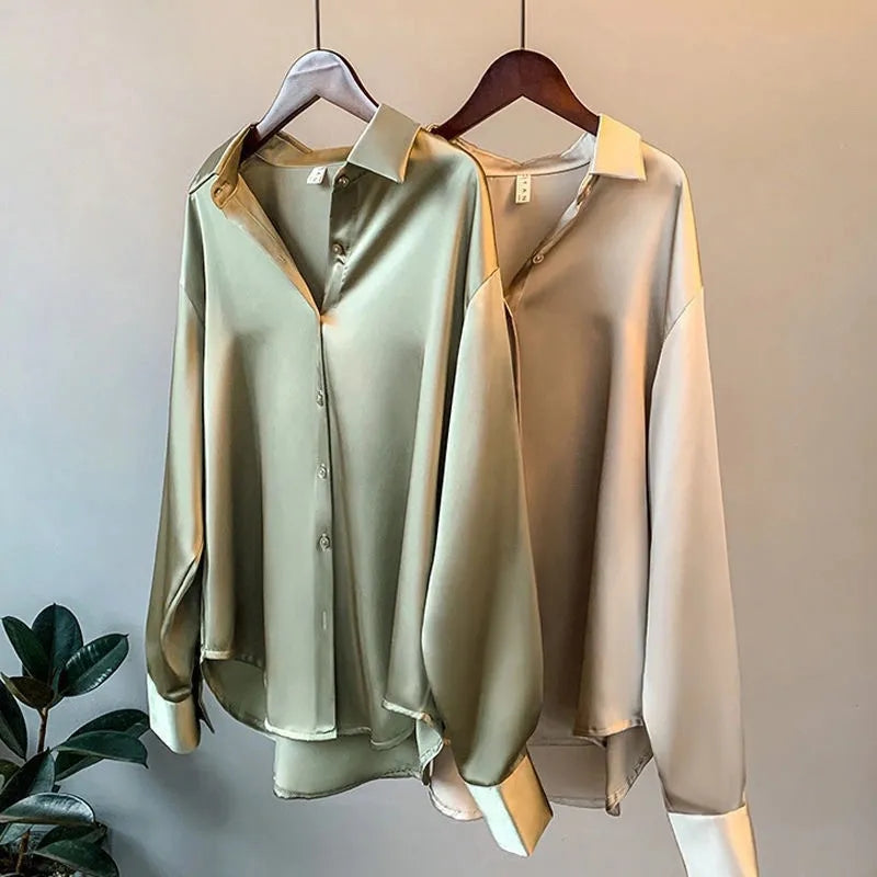 Chic women's elegant top with classic collar, long sleeves. Sophisticated button-up blouse for versatile office wear.