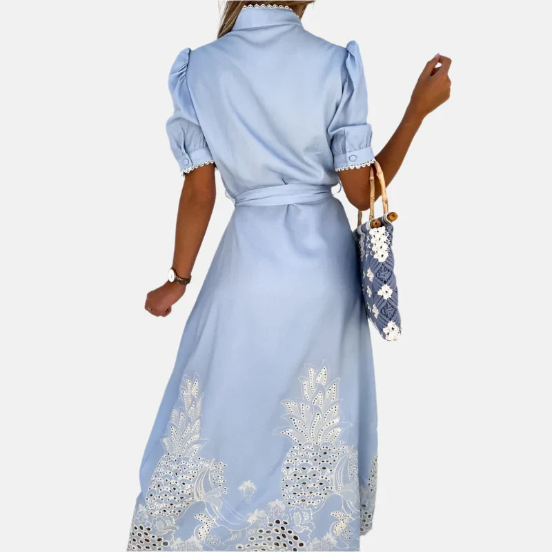 Embroidered blue A-line dress for women, featuring beautiful floral details. Ideal as a summer, spring, or party dress.