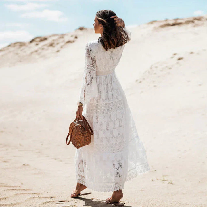 Flowy women's casual long sleeve maxi dress. Bohemian style, ideal for summer, beach, vacation, or relaxed wear.