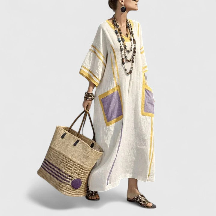 Elegant V-neck women's bohemian maxi dress, a stylish and flowy choice for summer day wear.