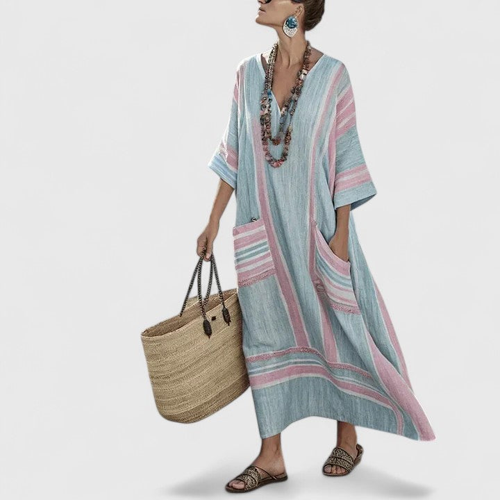 Bohemian women's elegant long maxi dress with V-neck, flowy fabric, great for summer vacation & casual wear.
