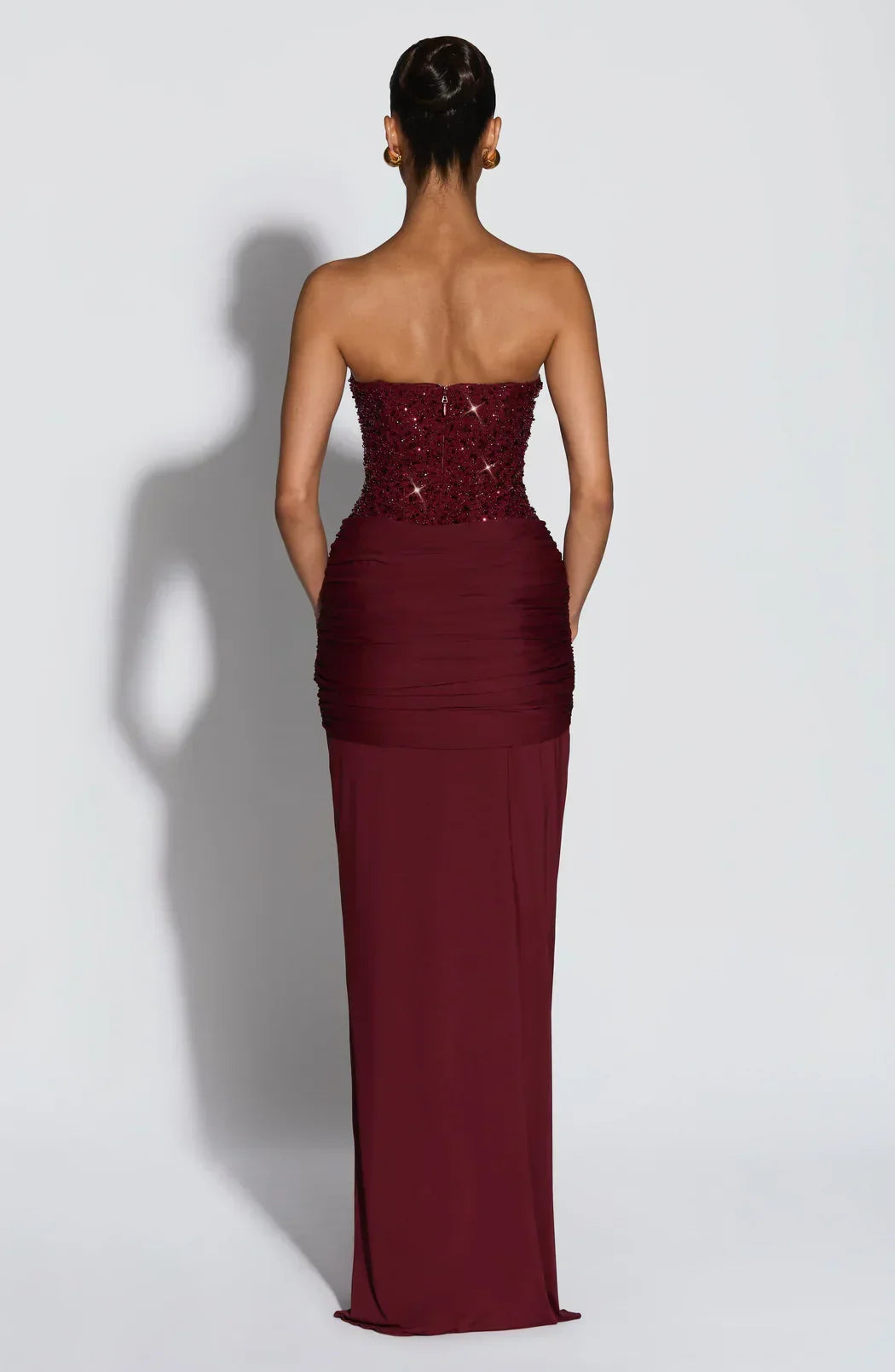 Chic red strapless maxi dress, women's corset style evening wear, ideal for formal parties.