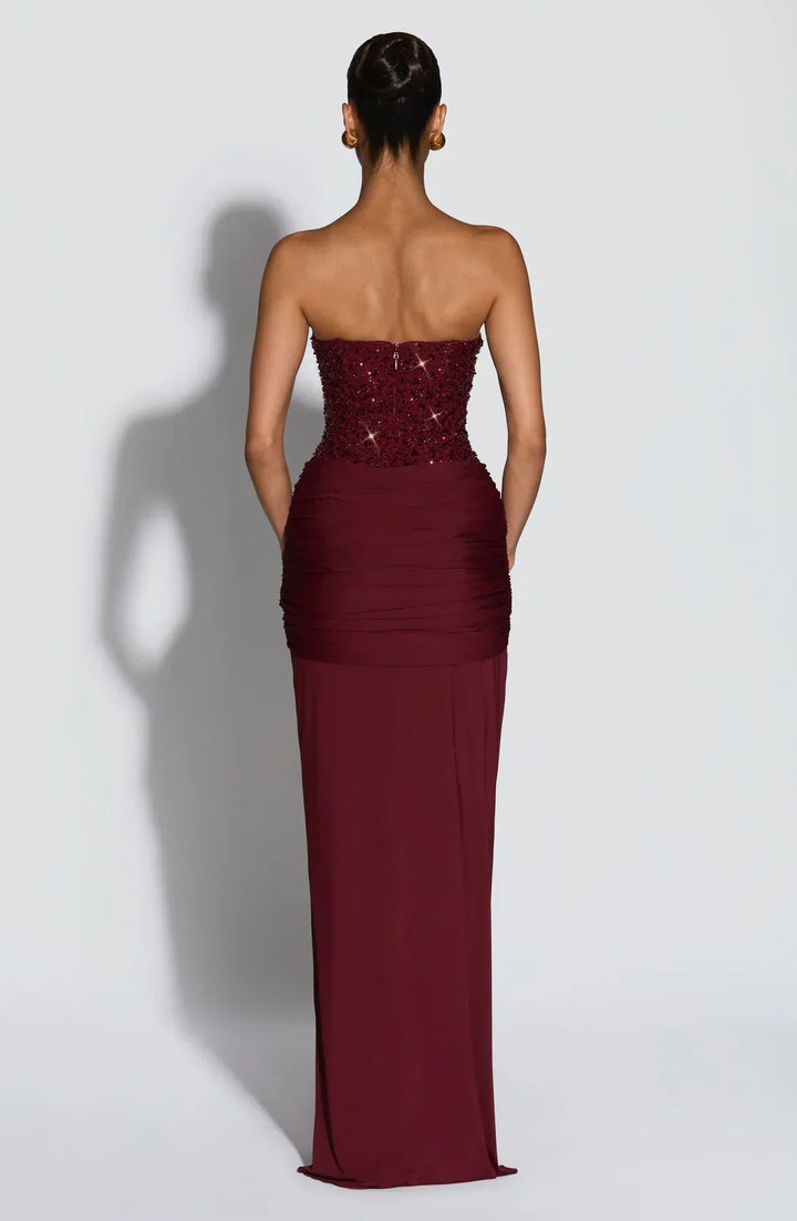 Chic red strapless maxi dress, women's corset style evening wear, ideal for formal parties.