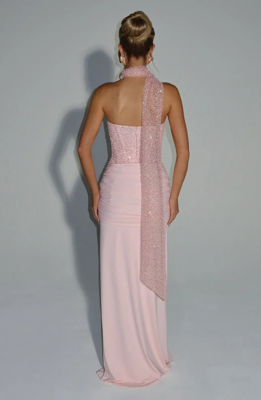 Elegant pink strapless corset maxi dress, women's party wear, perfect for wedding guests.