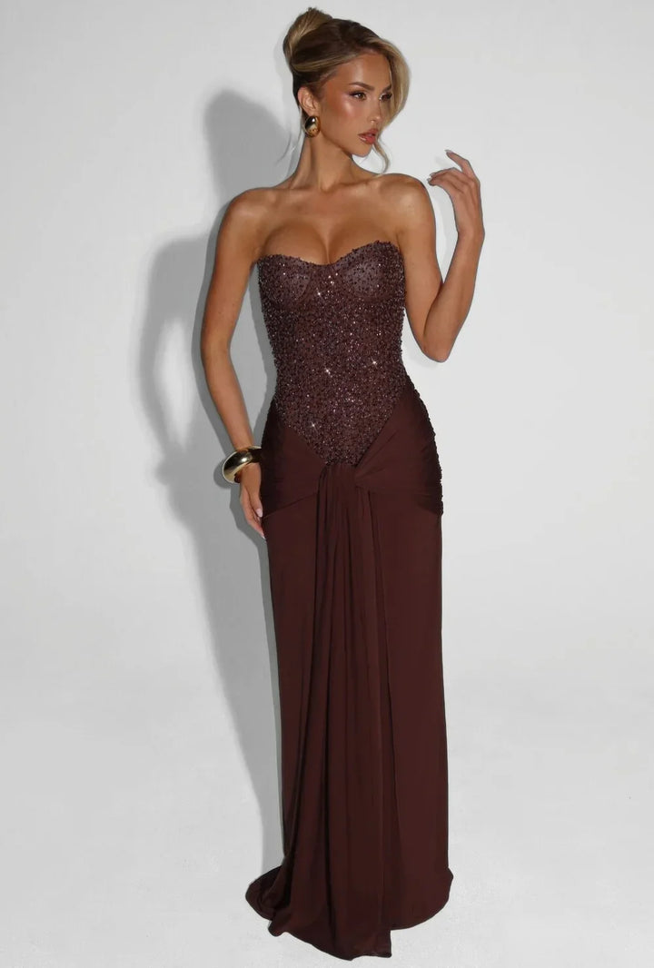 Pink women's elegant strapless maxi dress, corset design, perfect for evening parties.