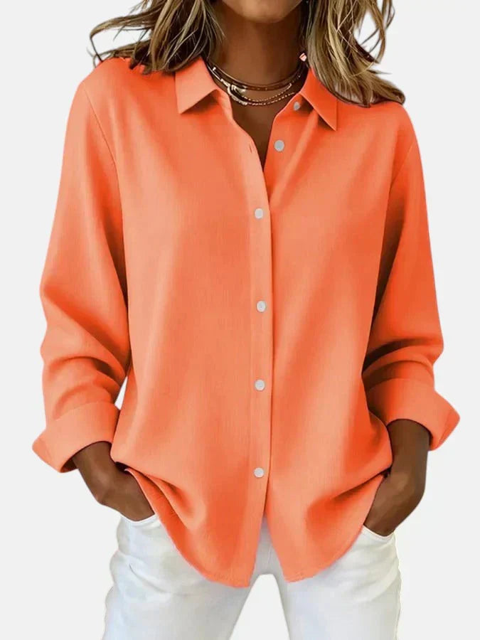 Fashionable women's blouse, featuring an elegant button collar & long sleeves for effortless style.