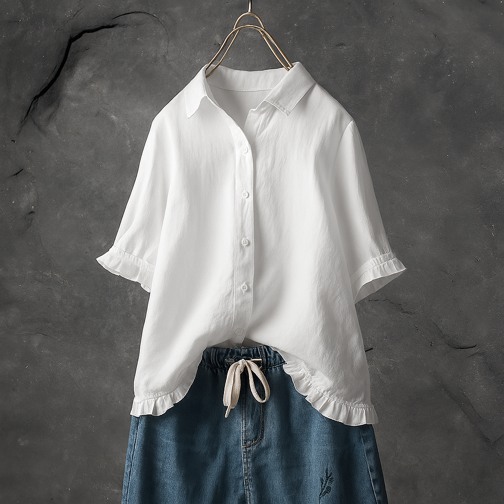 Slim fit long sleeve women's button-down blouse, a versatile elegant top with a chic ruffled hem for any occasion.