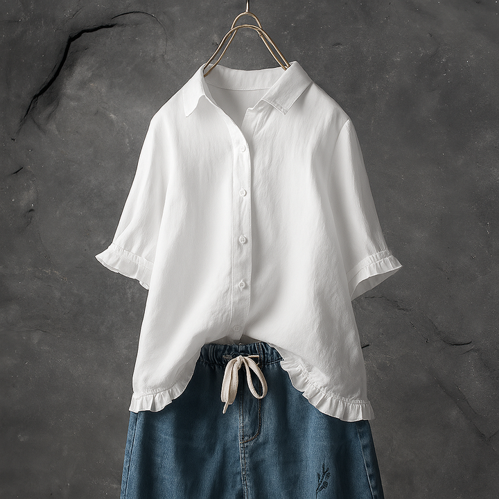 Slim fit long sleeve women's button-down blouse, a versatile elegant top with a chic ruffled hem for any occasion.