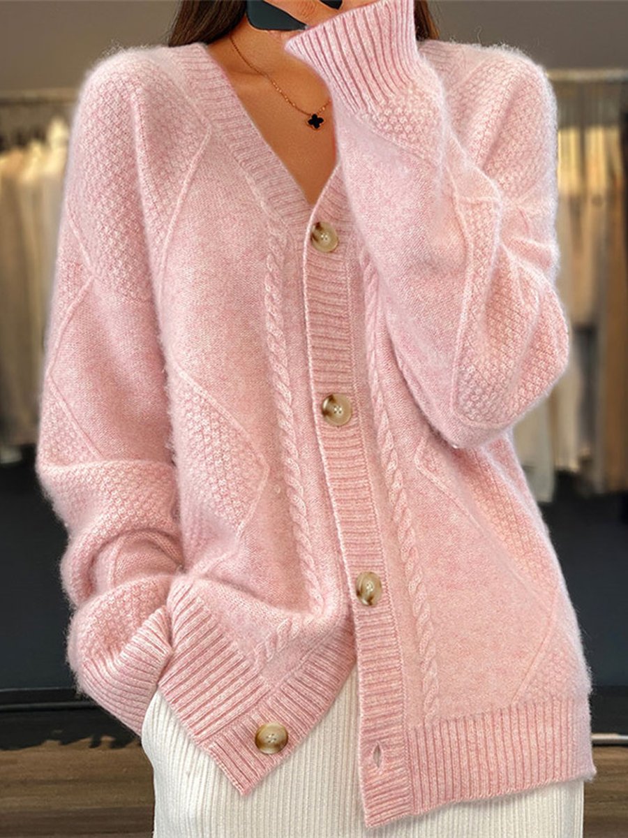 Fashionable women's cable knit V-neck cardigan. Elegant button-front long-sleeve sweater for stylish casual wear.