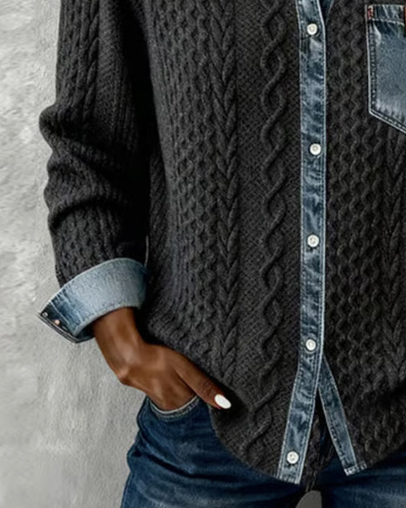 Intricate cable knit pattern on a women's button front long sleeve blouse, a stylish textured top.