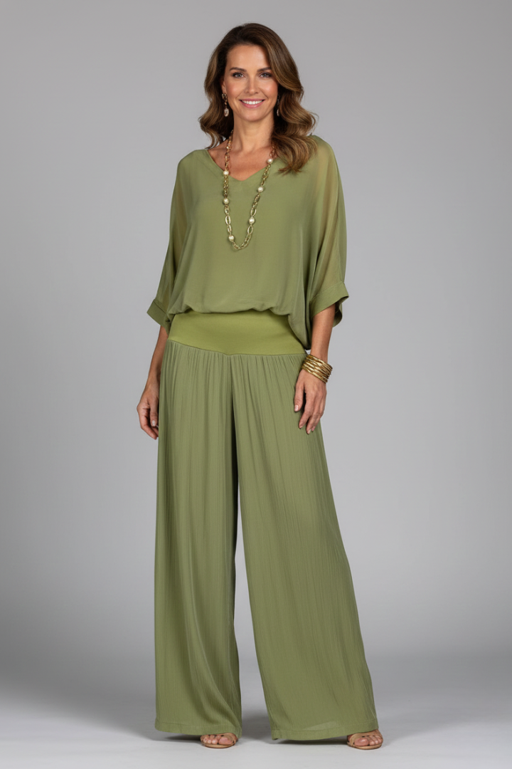Flowy chiffon two-piece set for women with wide-leg pants, offering comfort and style.