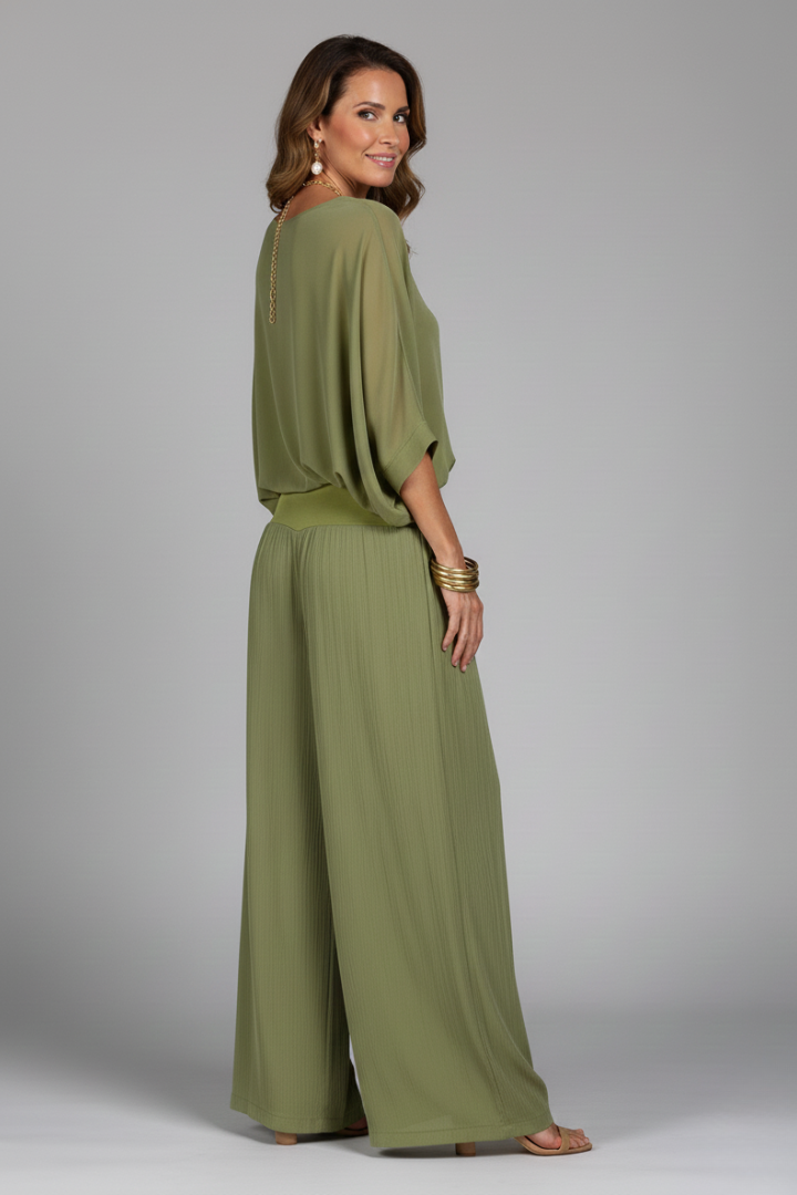 Stylish women's chiffon two-piece wide-leg set, ideal elegant resort wear for summer.
