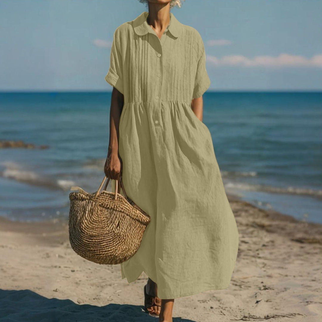 Everyday women's midi dress with collared neck & full button front, combining comfort & style.