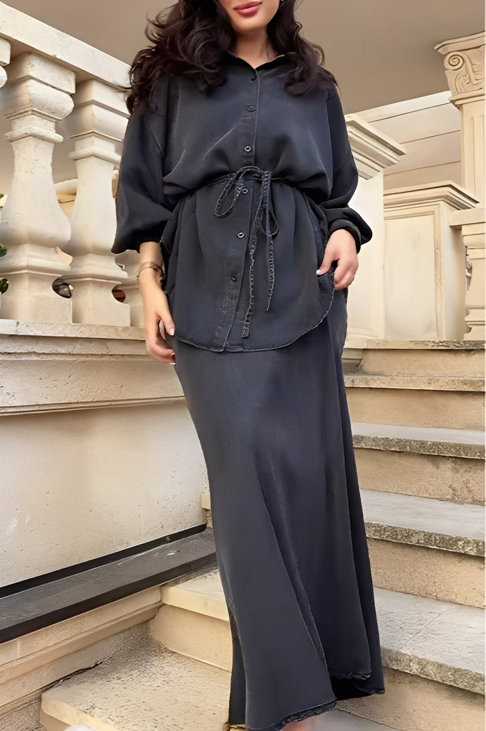 Women's elegant coordinated button-up shirt and maxi skirt set. Perfect two-piece outfit for a chic look.