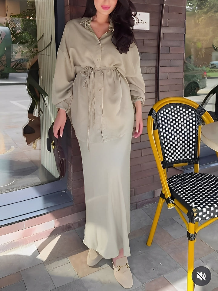 Women's two-piece set featuring a stylish button-up long-sleeve shirt and a matching elegant maxi skirt.