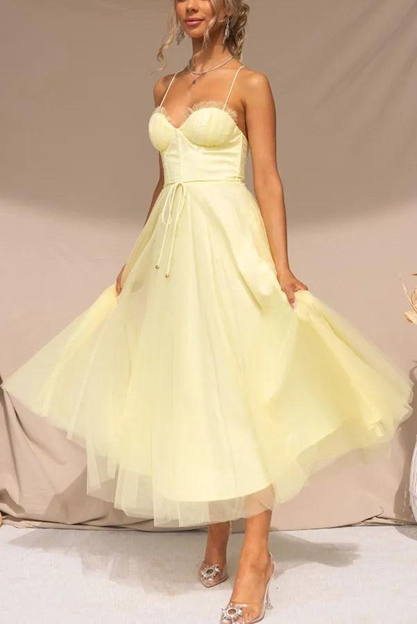 Formal women's midi dress, ideal for wedding guests & evening parties. Features a chic corset bodice.