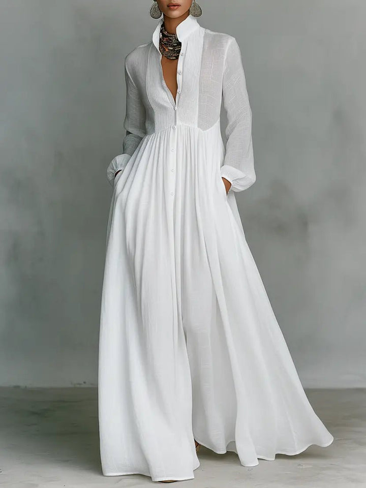 Women's elegant cotton linen maxi dress with stand collar, button front, and subtle patchwork detail.
