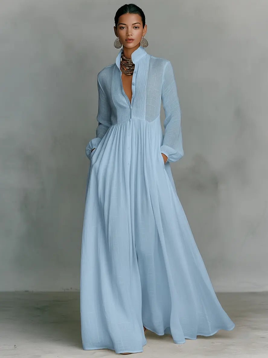 Flowy cotton linen long dress for women. Features stand collar, button front, and chic patchwork design.