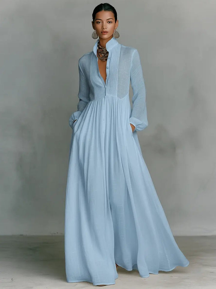 Flowy cotton linen long dress for women. Features stand collar, button front, and chic patchwork design.