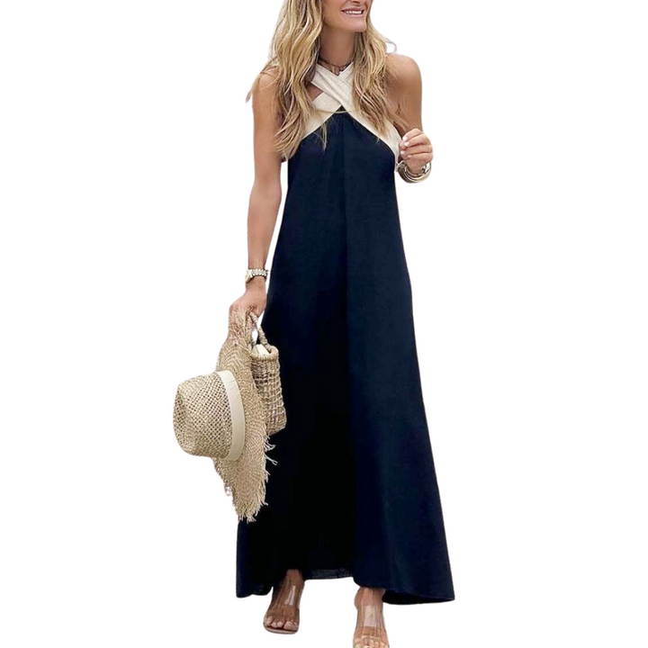 Stylish cross-neck A-line summer dress, perfect for casual or vacation wear.
