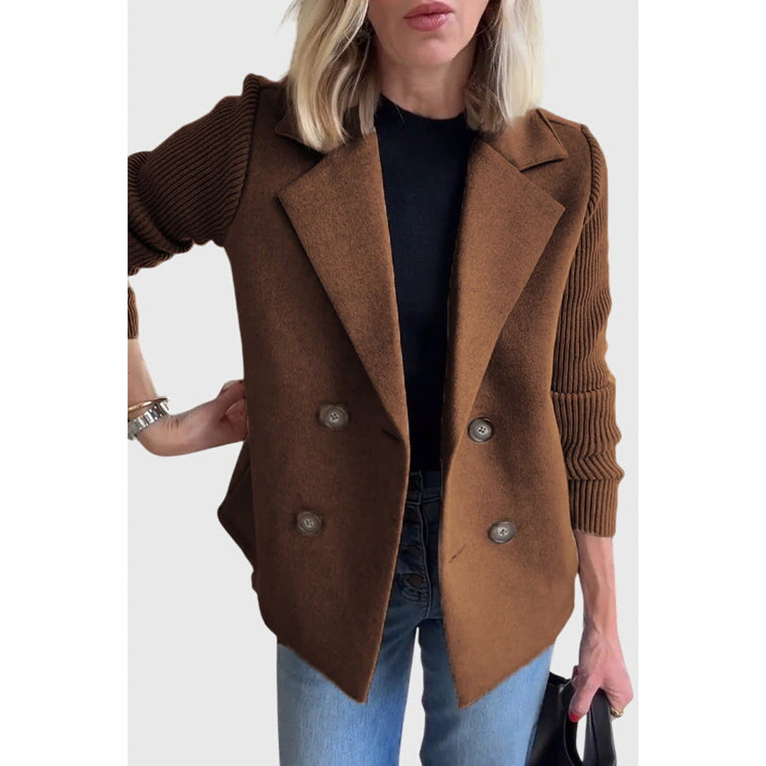 Tailored women's double-breasted blazer jacket, offering a professional fit for workwear and elegant occasions.
