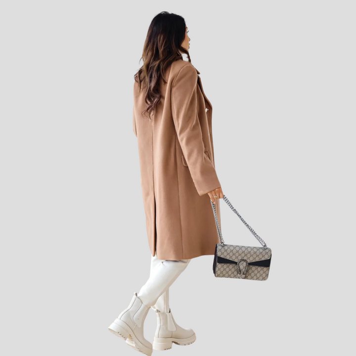 Warm & elegant women's double-breasted winter coat, a versatile long jacket for chic cold-weather outfits.
