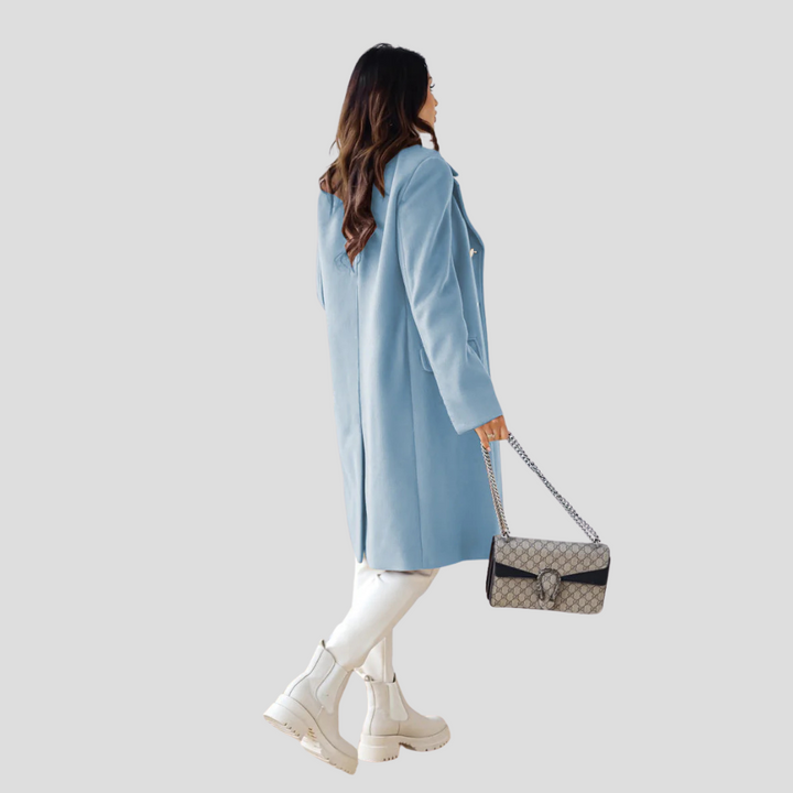 Sophisticated women's double-breasted coat with wide lapels, offering a chic, tailored fit for any occasion.
