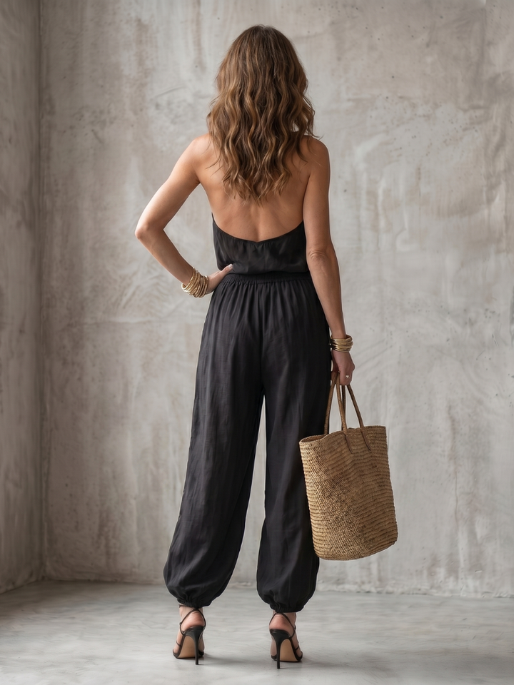 Sleeveless drape neck fluid top and wide leg pants, a comfortable women's two-piece set perfect for elegant casual.