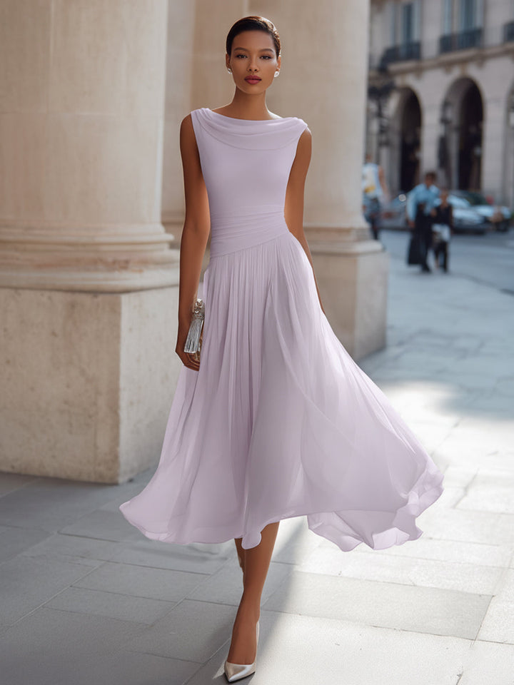 Women's stylish pleated midi occasion dress with a graceful draped neck. Ideal for wedding guests.