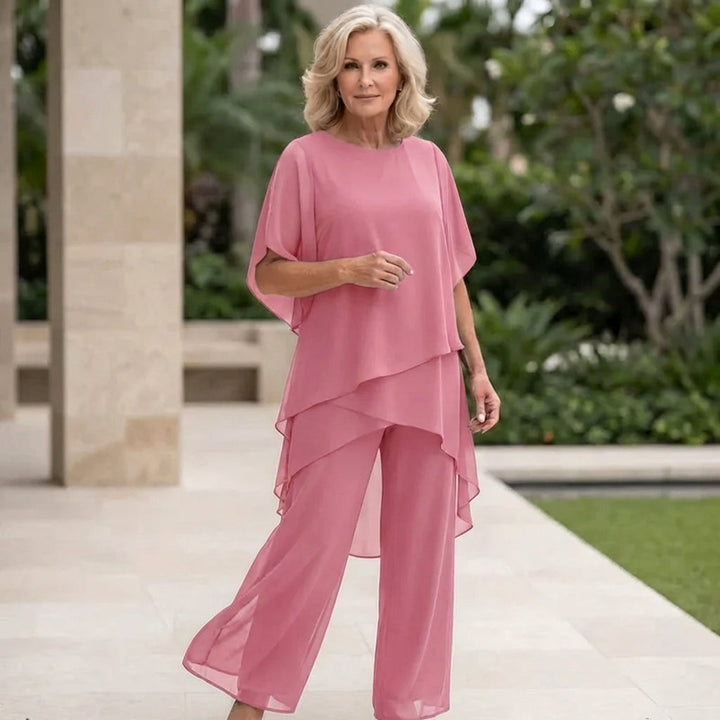 Chic women's two-piece ensemble with flowing draped palazzo pants, offering elegant and effortless style.