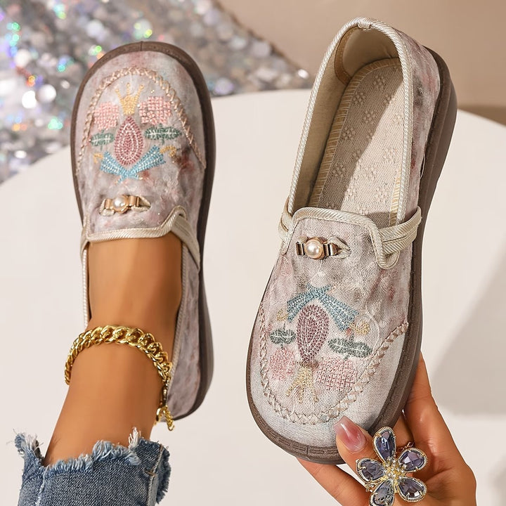 Women's elegant embroidered floral loafers with exquisite pearl detail, perfect for stylish casual wear.