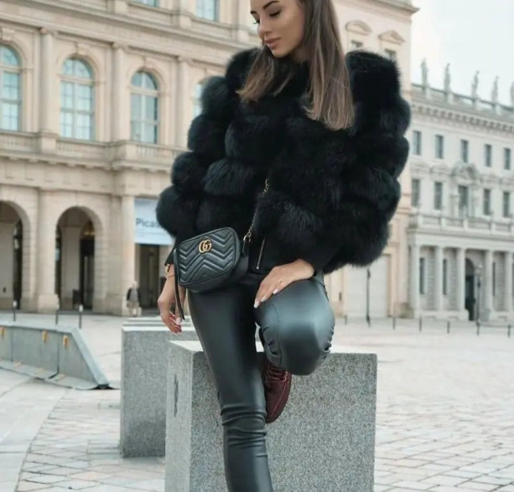 Fashion-forward women's faux fur outerwear, designed for warmth & style.