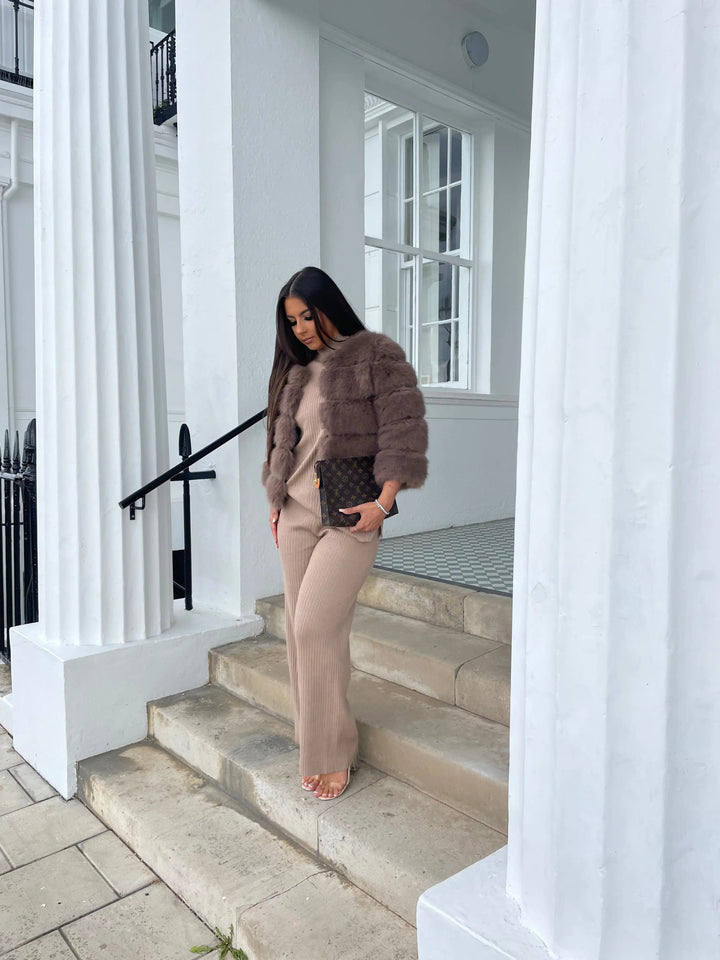 Luxurious faux fur coat for women, perfect for stylish winter outfits.