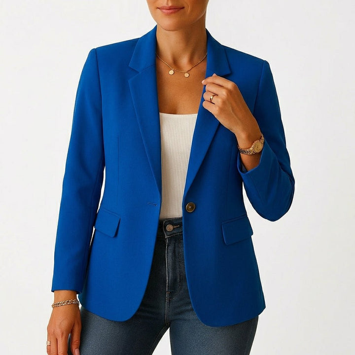 Classic women's white fitted single-breasted blazer, offering elegant style for professional comfort.