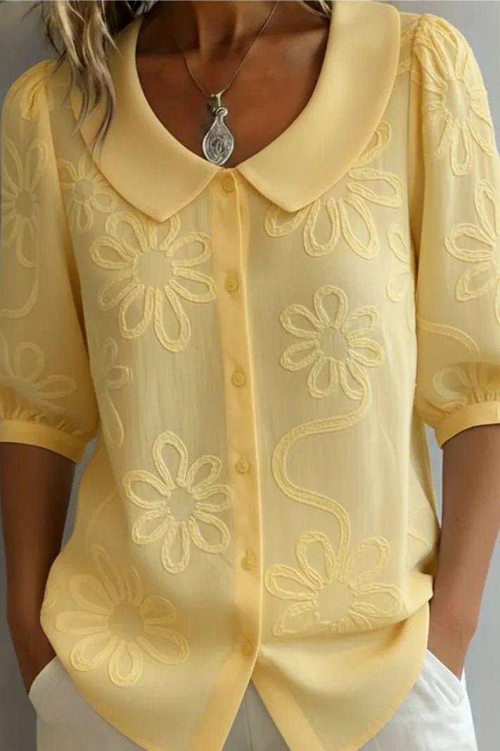 Women's elegant floral blouse, relaxed fit, perfect for spring/summer casual wear.