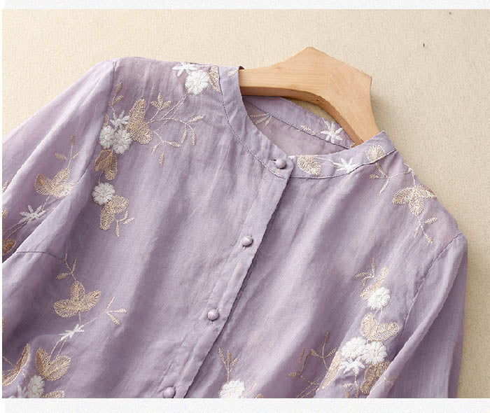 Vibrant floral print women's button-down blouse with 3/4 sleeves, a perfect lightweight top for spring/summer.