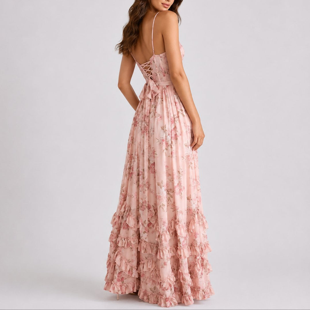 Elegant women's floral maxi dress, a stylish wedding guest gown with corset, spaghetti straps, & ruffle hem.