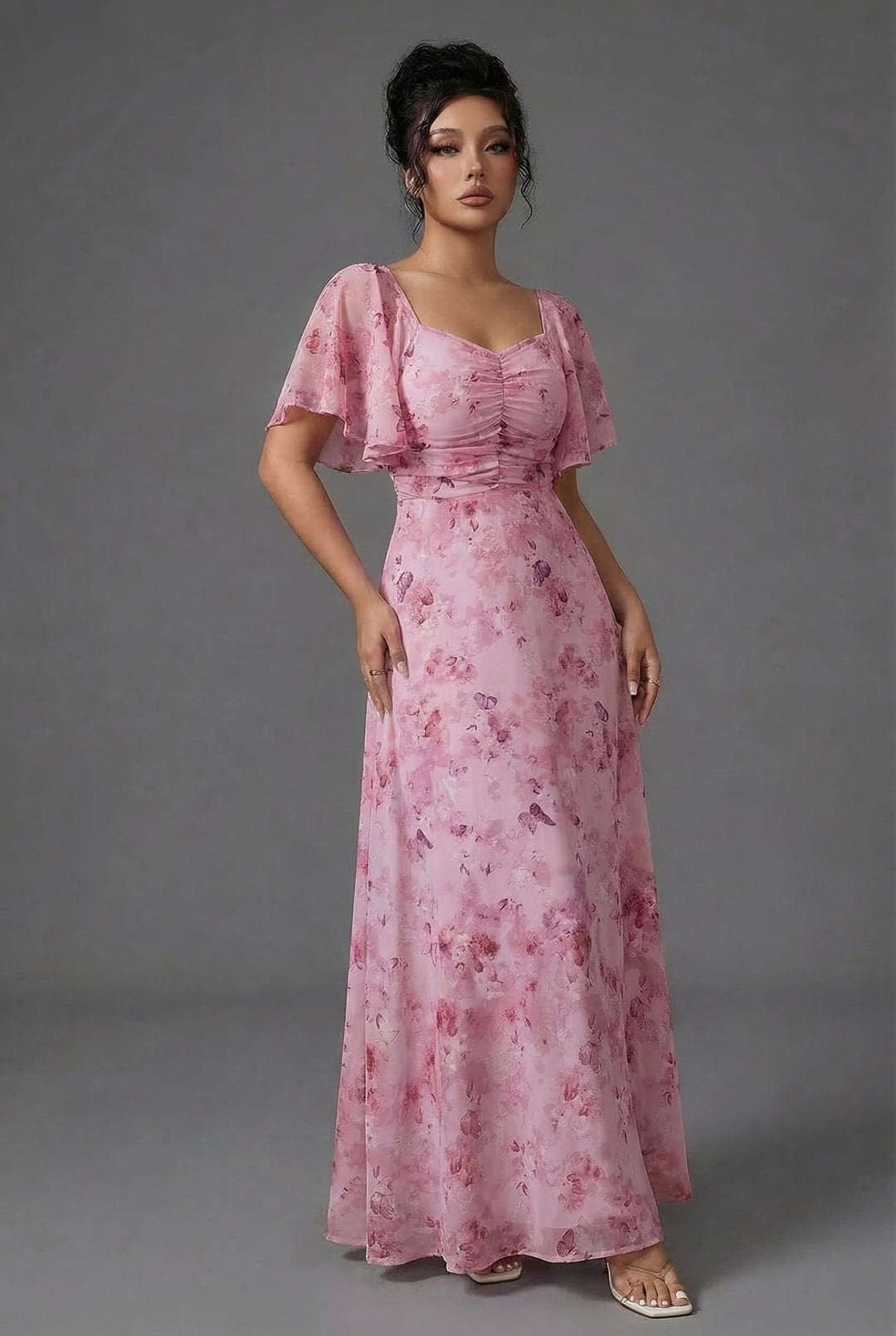 Flowy women's long floral dress with delicate flutter sleeves, perfect for summer, spring, or formal wear.