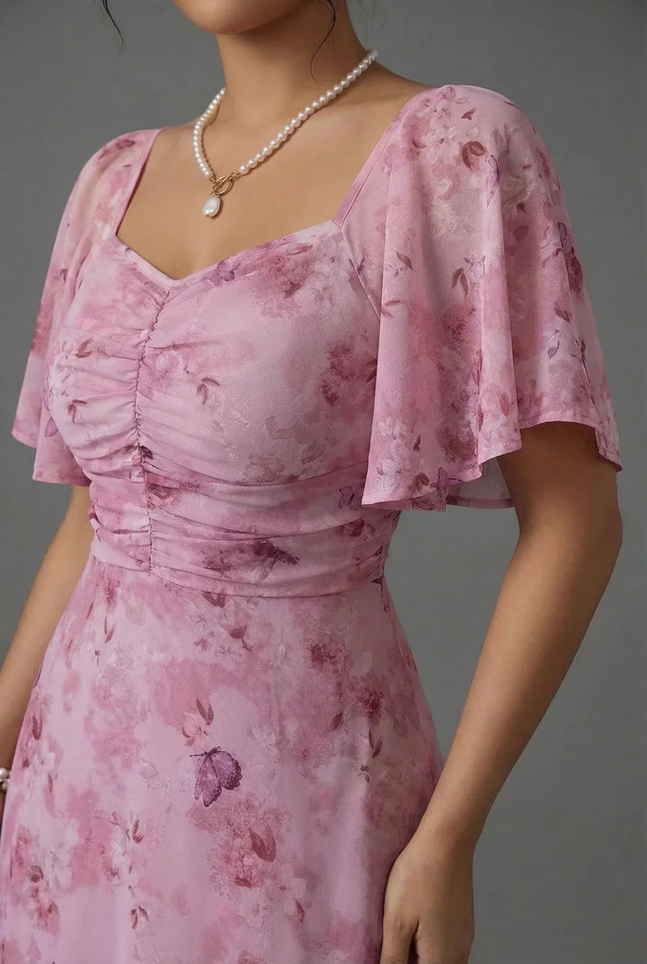 Stunning women's floral flutter sleeve maxi dress, versatile for wedding guests, formal events, & parties.