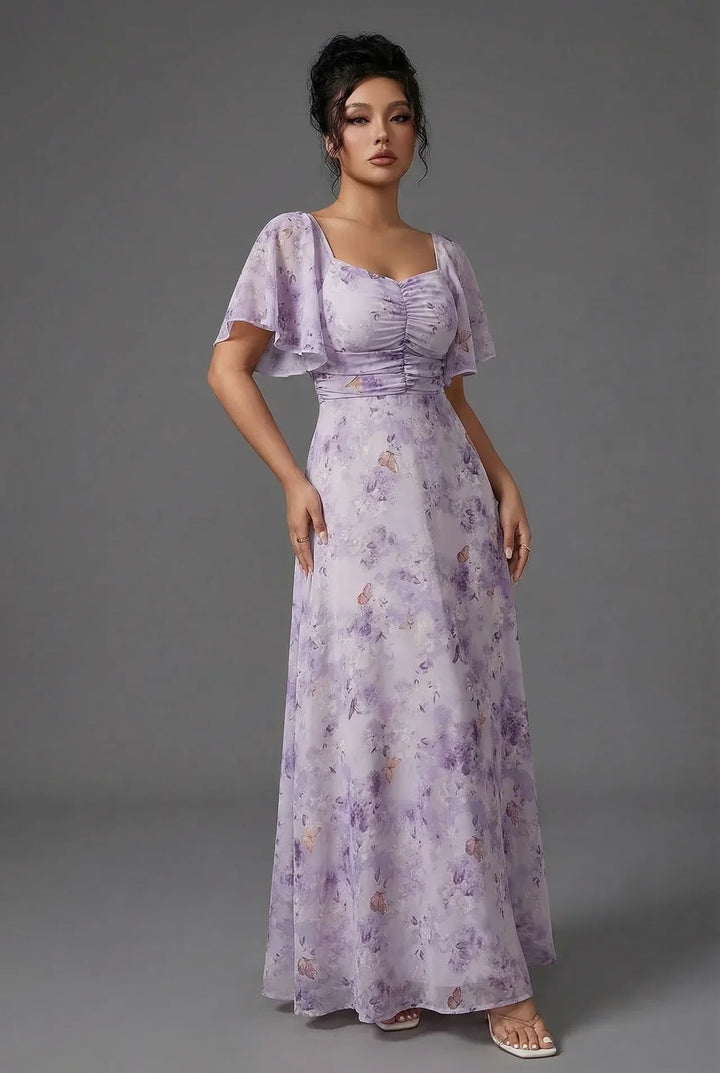 Women's elegant long floral dress with flutter sleeves & sweetheart neckline, great for special occasions.