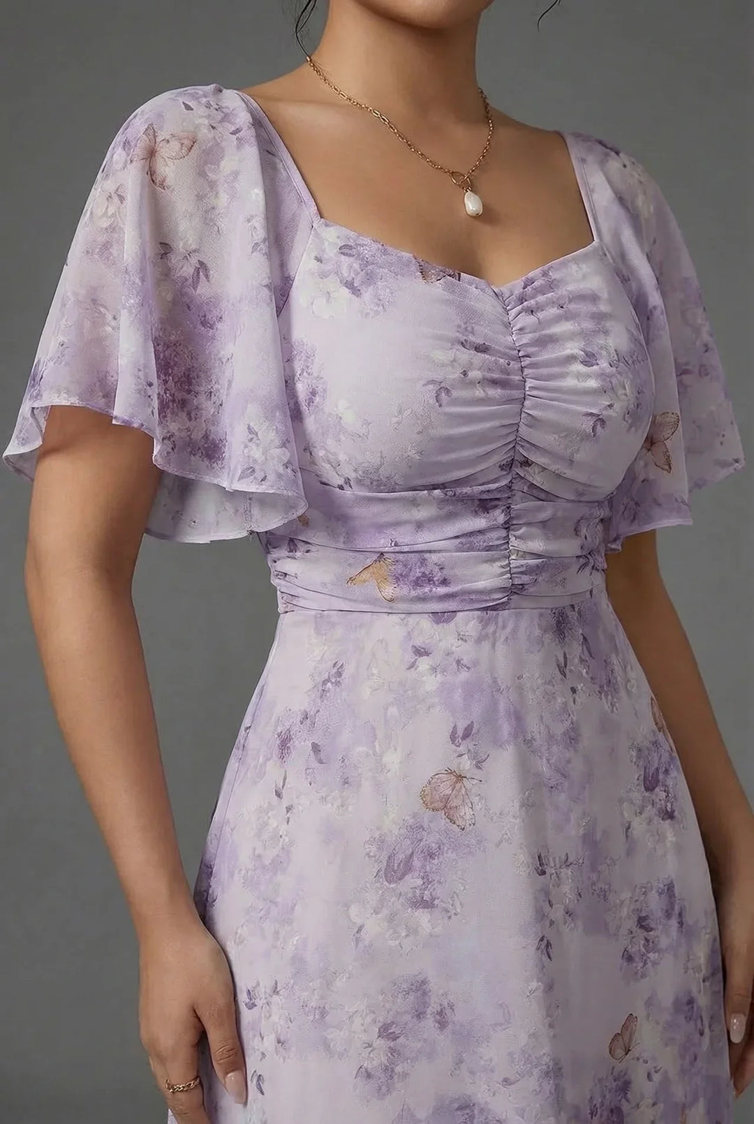 Women's beautiful floral flutter sleeve maxi dress, a perfect romantic choice for wedding guests & parties.