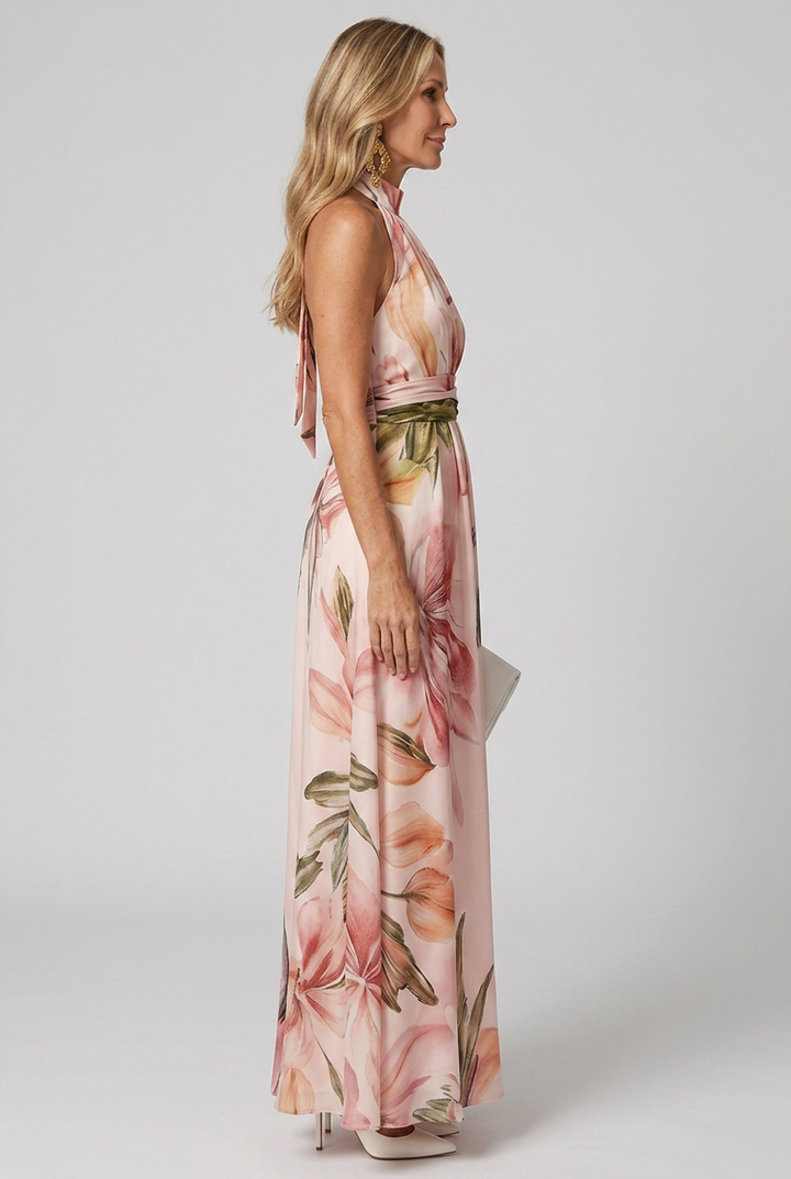 Comfortable women's flowing floral maxi dress with a chic halter design, great for summer events.